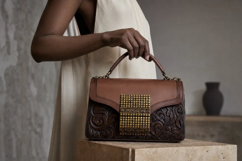 Handmade leather goods arranged on a workbench